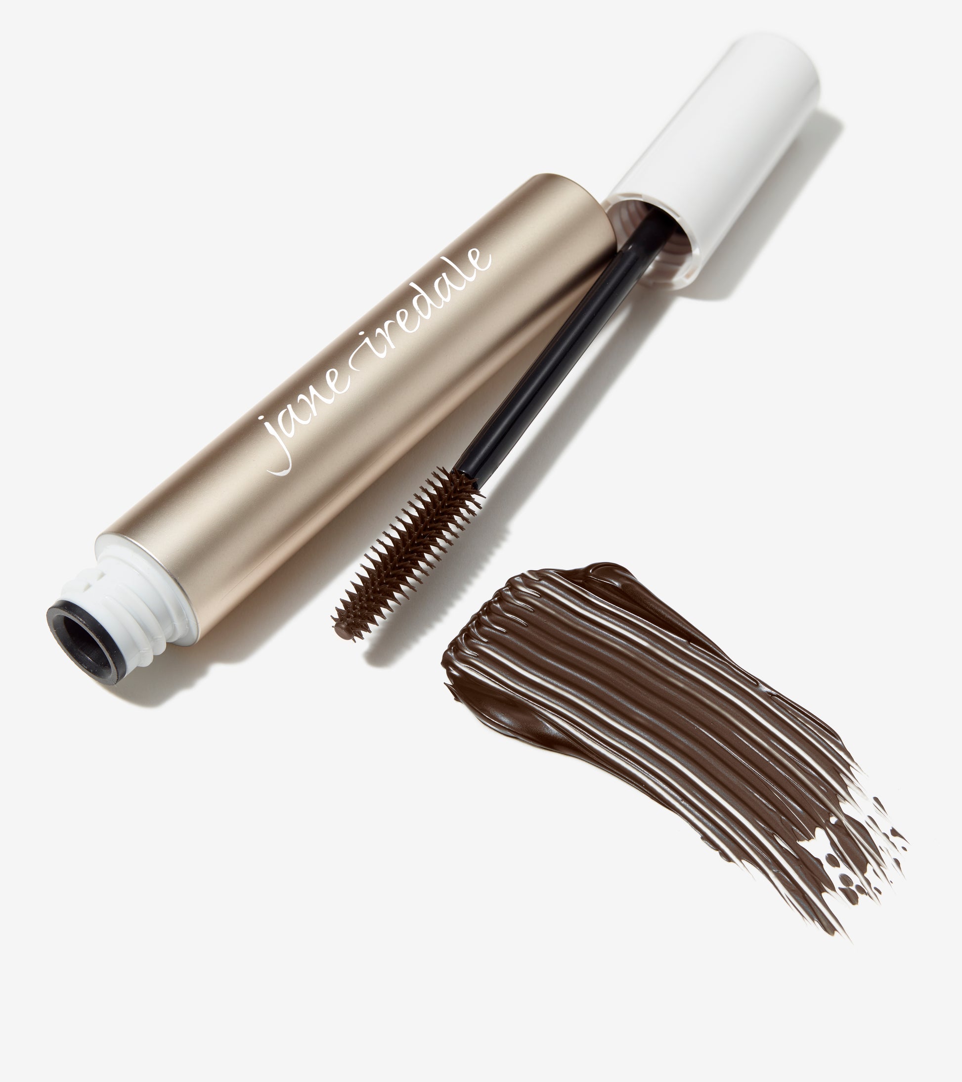 Jane Iredale Lash Fixation Length & Definition Tubing Mascara with wand and brown formula swatch, showcasing lengthening, smudge-proof, easy-removal features for beautifully defined lashes.