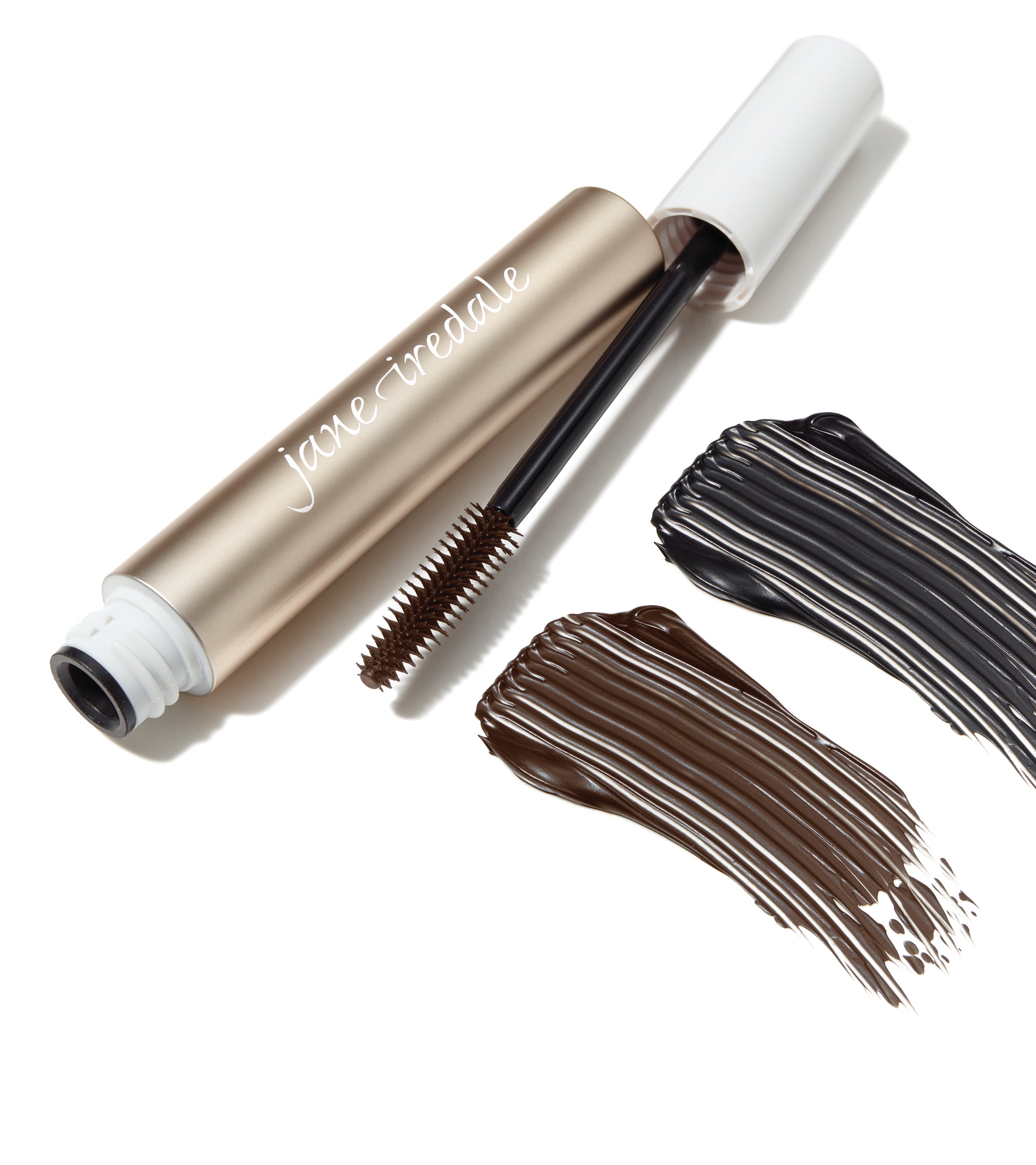 Lash Fixation Length & Definition Tubing Mascara with wand and brown-black swatches, showcasing lengthening, smudge-proof formula available at Beauty Shop Bellaire.