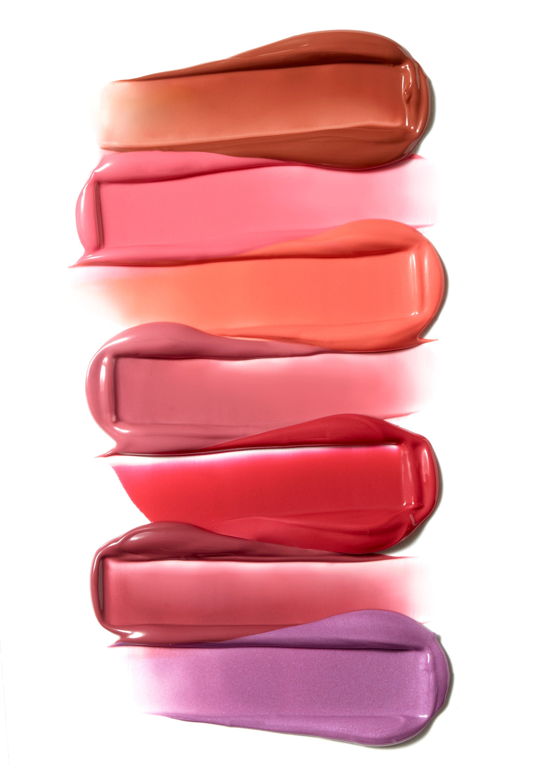 ColorLuxe Liquid Blush swatches display six creamy shades, showcasing buildable, seamless, long-lasting color for a natural flush. Perfect for diverse skin tones from Beauty Shop Bellaire.
