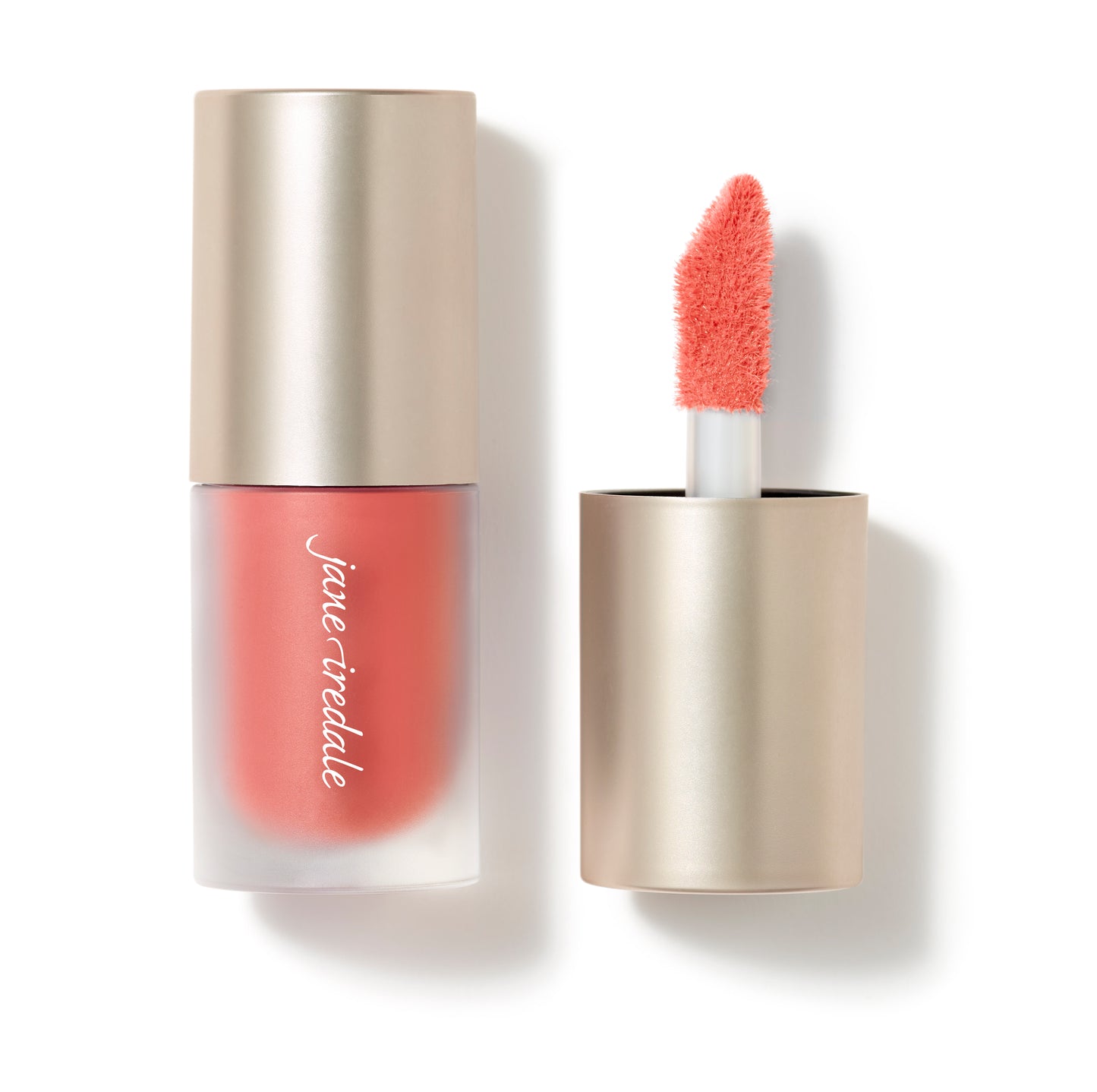ColorLuxe Liquid Blush in frosted tube with matte gold cap, featuring a coral doe-foot applicator, offering buildable, seamless, long-lasting color for a natural flush.