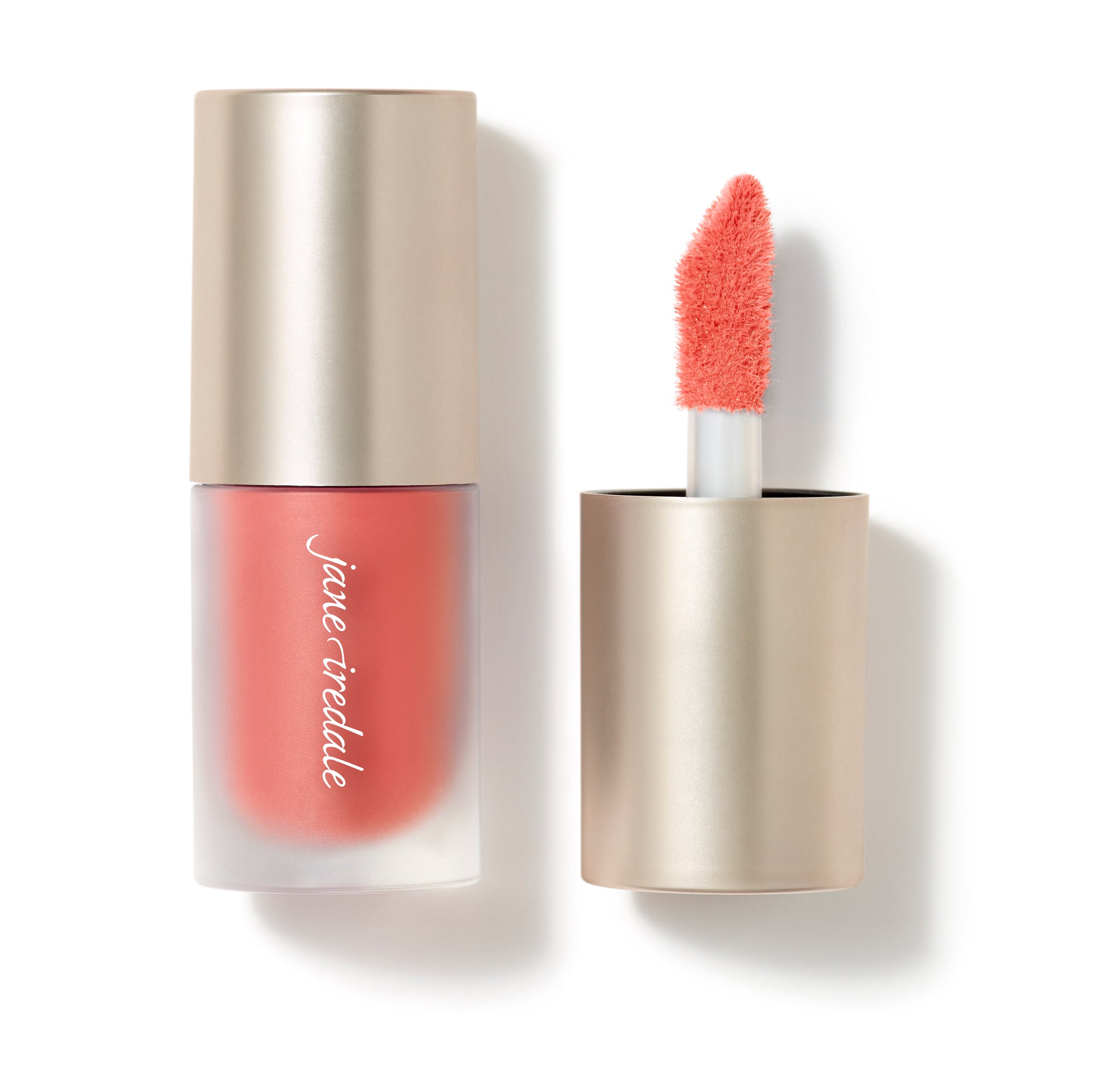 ColorLuxe Liquid Blush in frosted tube with matte gold cap, featuring a coral doe-foot applicator, offering buildable, seamless, long-lasting color for a natural flush.