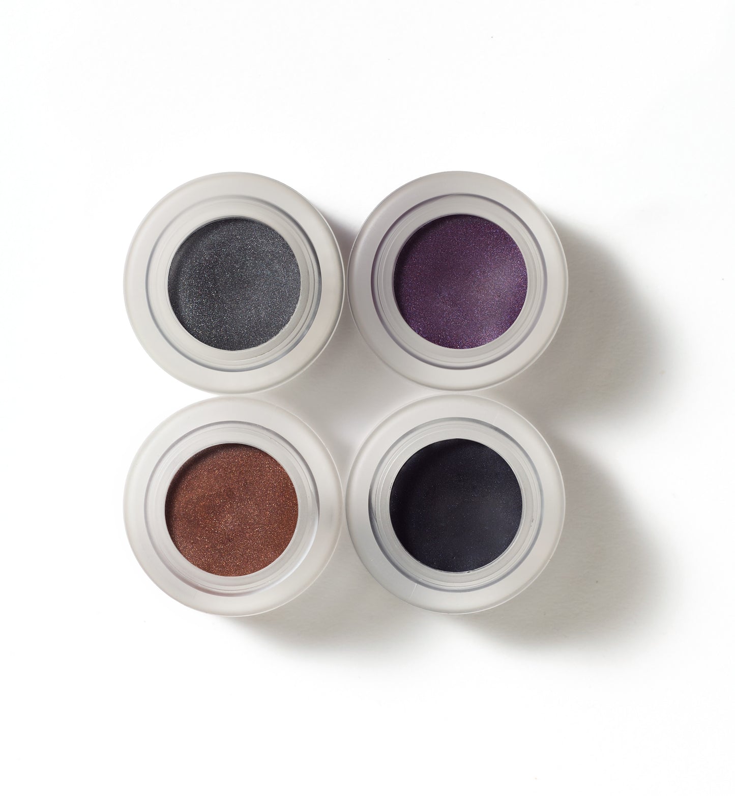 Mystikol® Powdered Eyeliner pots in four shades for versatile eye looks; ideal for sensitive eyes, offering wet or dry application for smoky or precise lines.