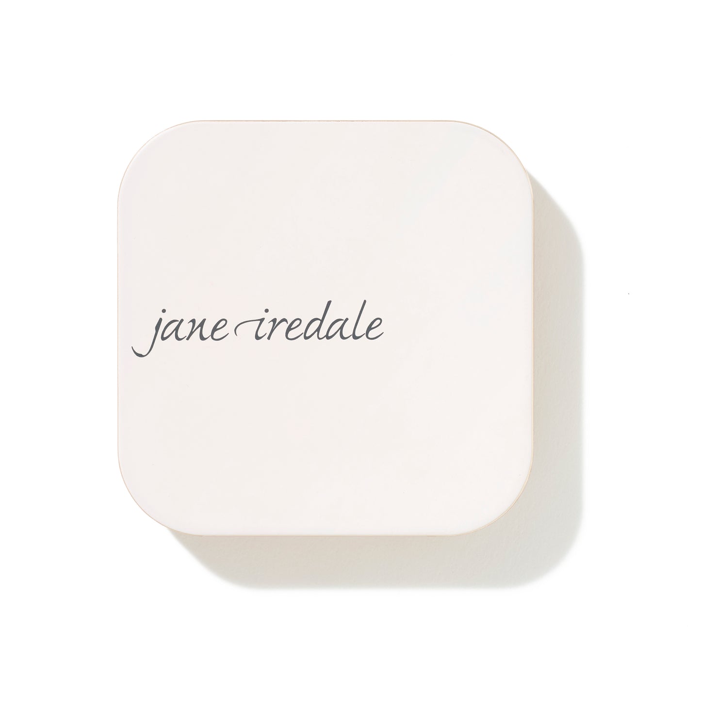 Jane Iredale's PurePressed® Blush compact, a sleek white case, offers a silky, buildable mineral formula with antioxidant protection for a natural, long-lasting flush.