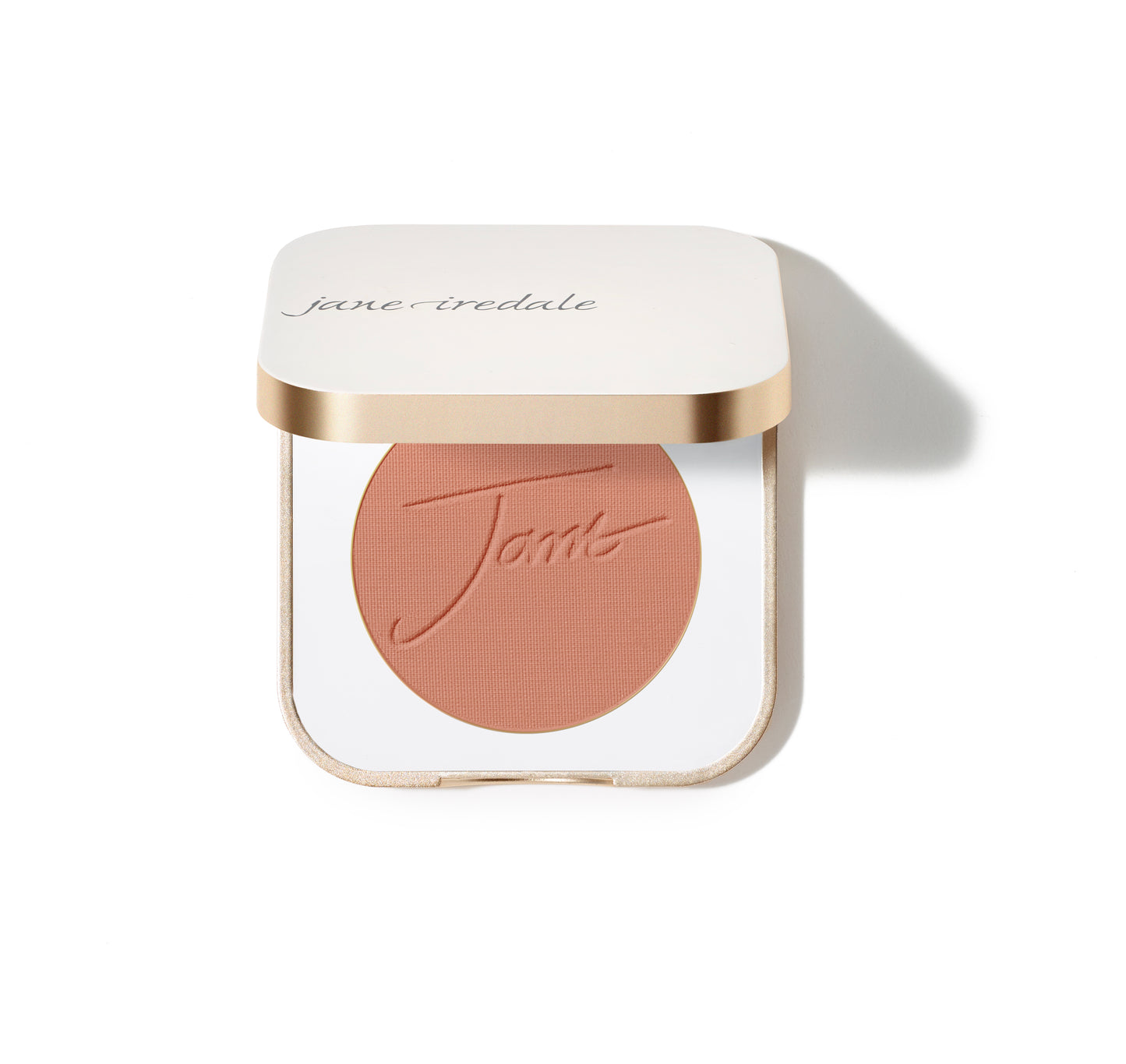 Jane Iredale PurePressed® Blush in a white and gold compact, featuring a warm coral shade. This mineral blush offers buildable coverage with antioxidant-rich ingredients.