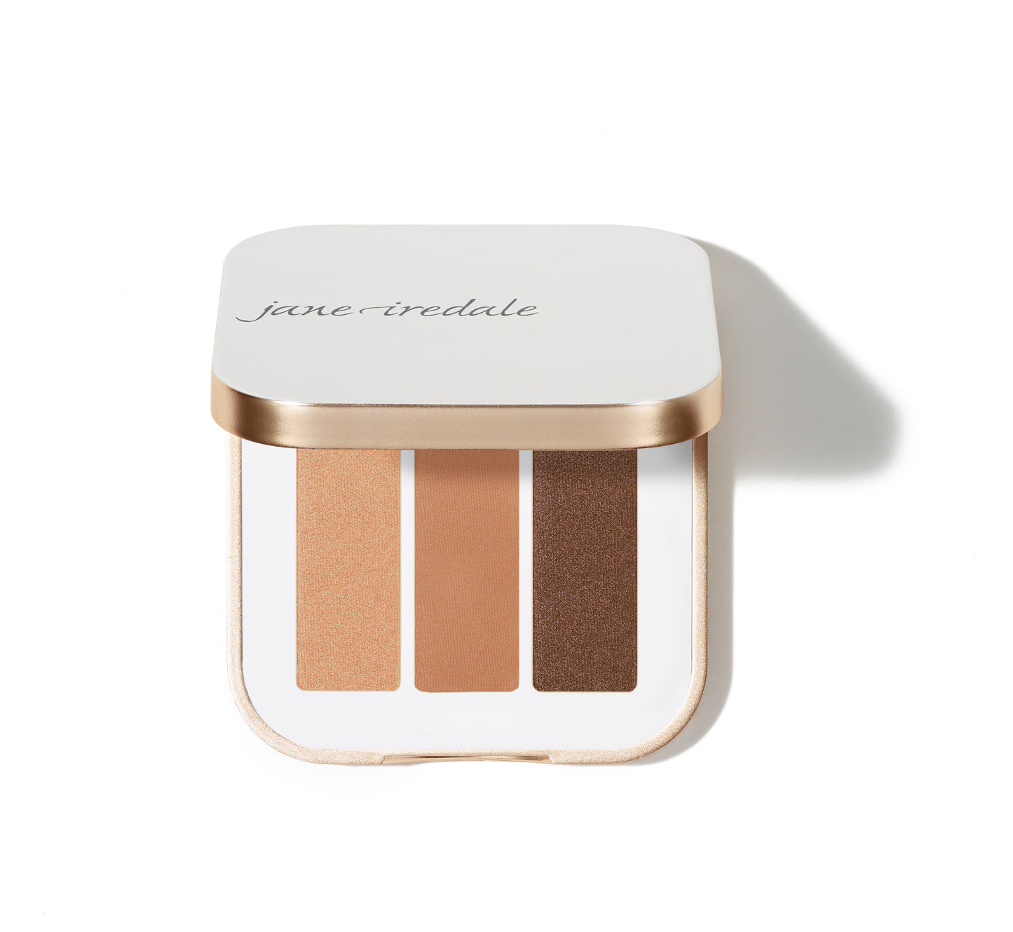 PurePressed® Eye Shadow Triple in a sleek white-and-gold compact, featuring three warm shades for versatile eye looks. Vegan, talc-free, refillable, perfect for clean beauty enthusiasts.