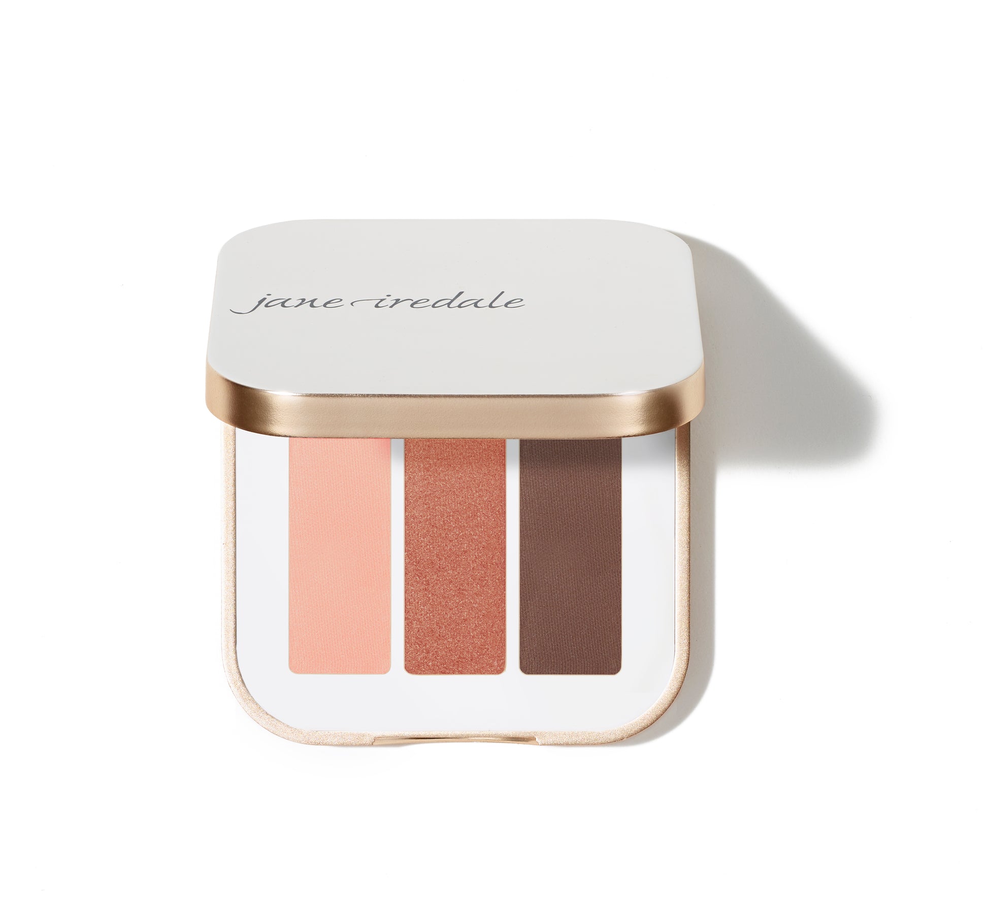 PurePressed® Eye Shadow Triple compact with matte peach, shimmery copper, matte chocolate shades in white case, rose-gold trim, jane iredale logo. Vegan, talc-free, refillable.