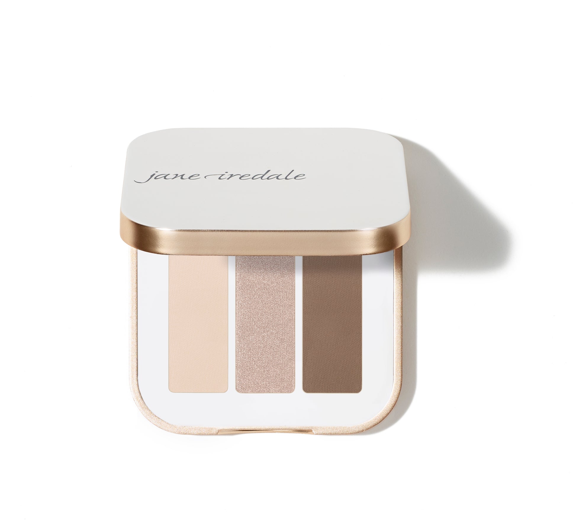 PurePressed® Eye Shadow Triple by Jane Iredale: a white, gold-trim compact with three harmonized shades for versatile eye looks, featuring a vegan, talc-free formula.