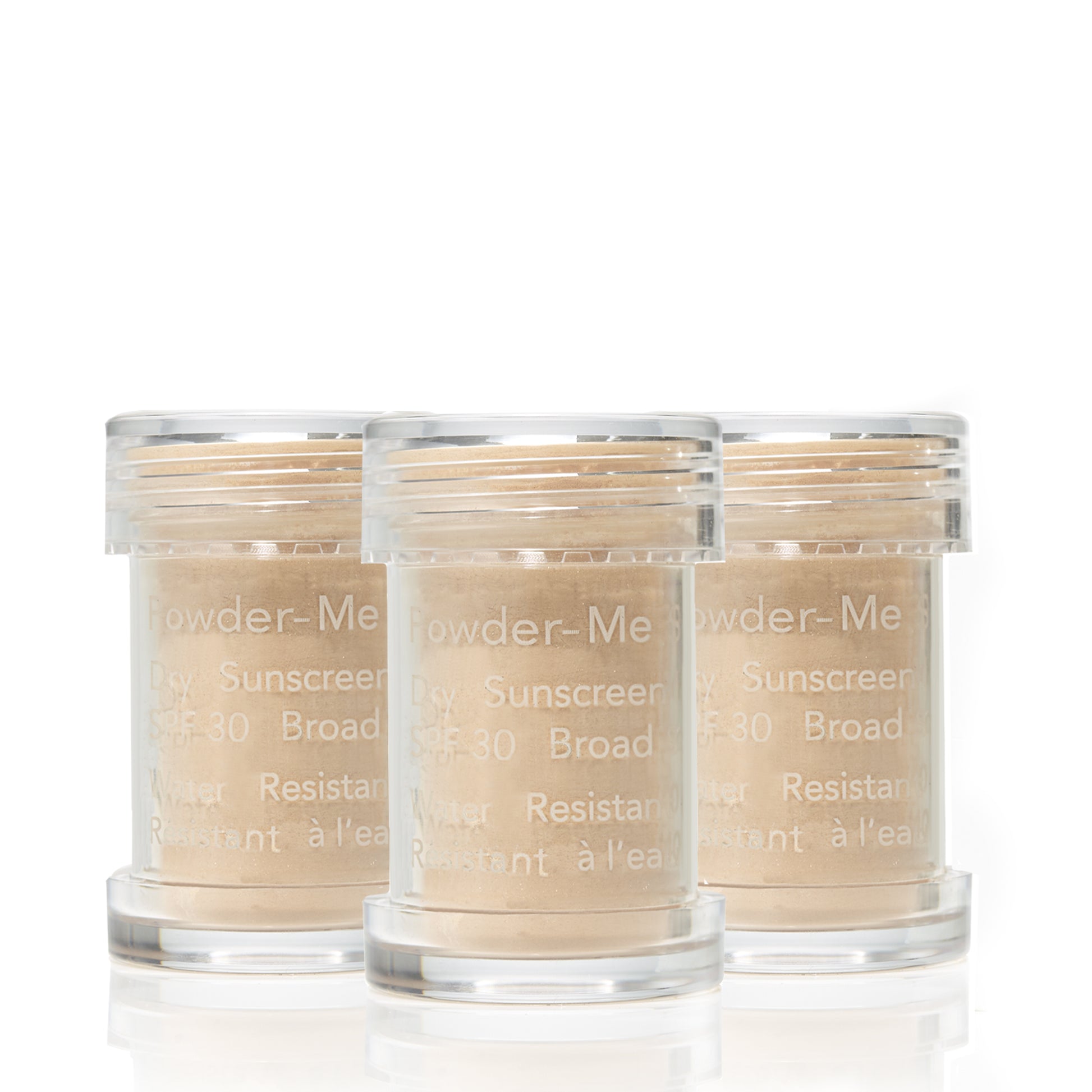 Powder-Me SPF 30 Dry Sunscreen in sifter jars, featuring broad-spectrum, water-resistant protection in a powder form.