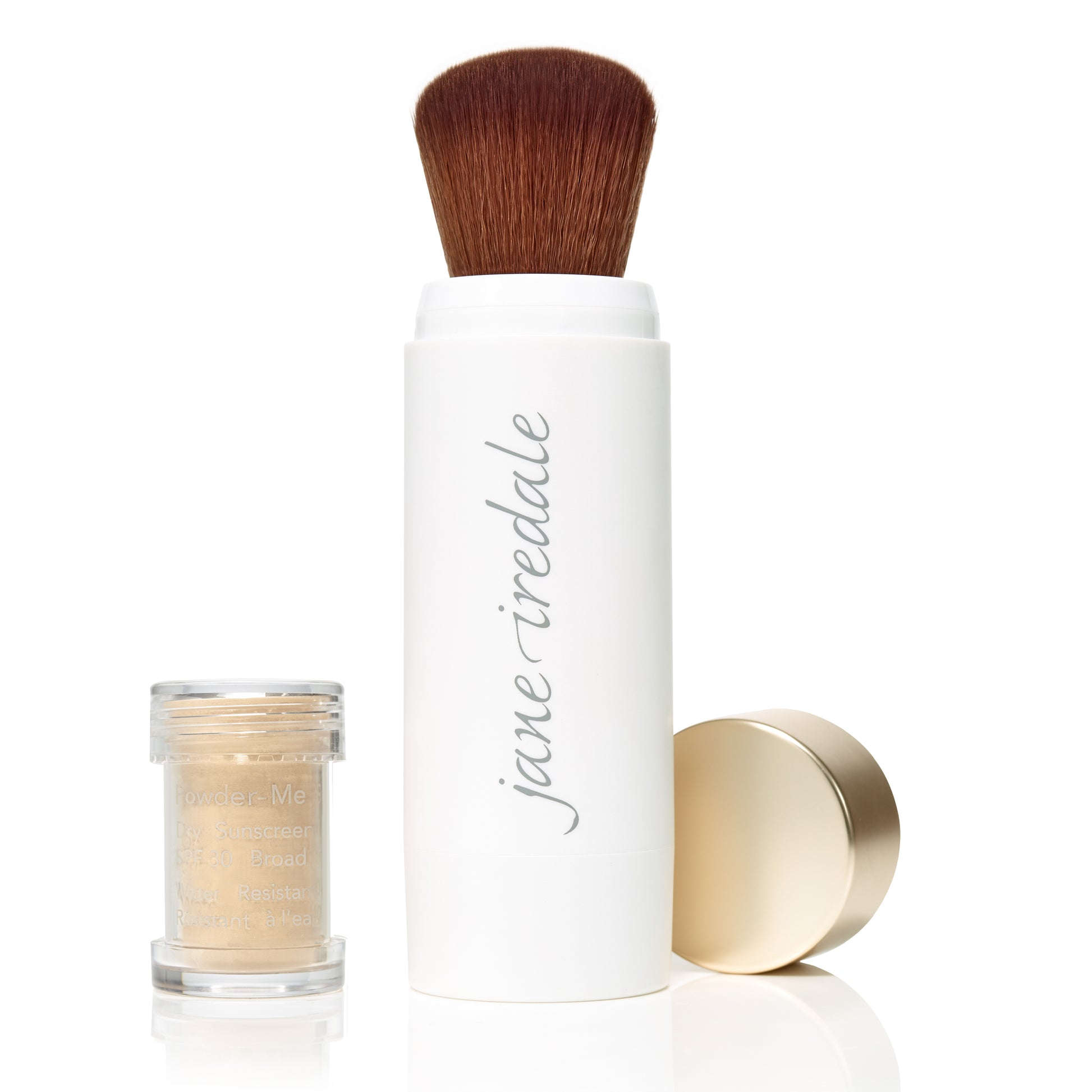 Powder-Me SPF 30 Dry Sunscreen kit with jane iredale applicator brush and loose beige powder jar, ideal for clean, sustainable beauty routines.