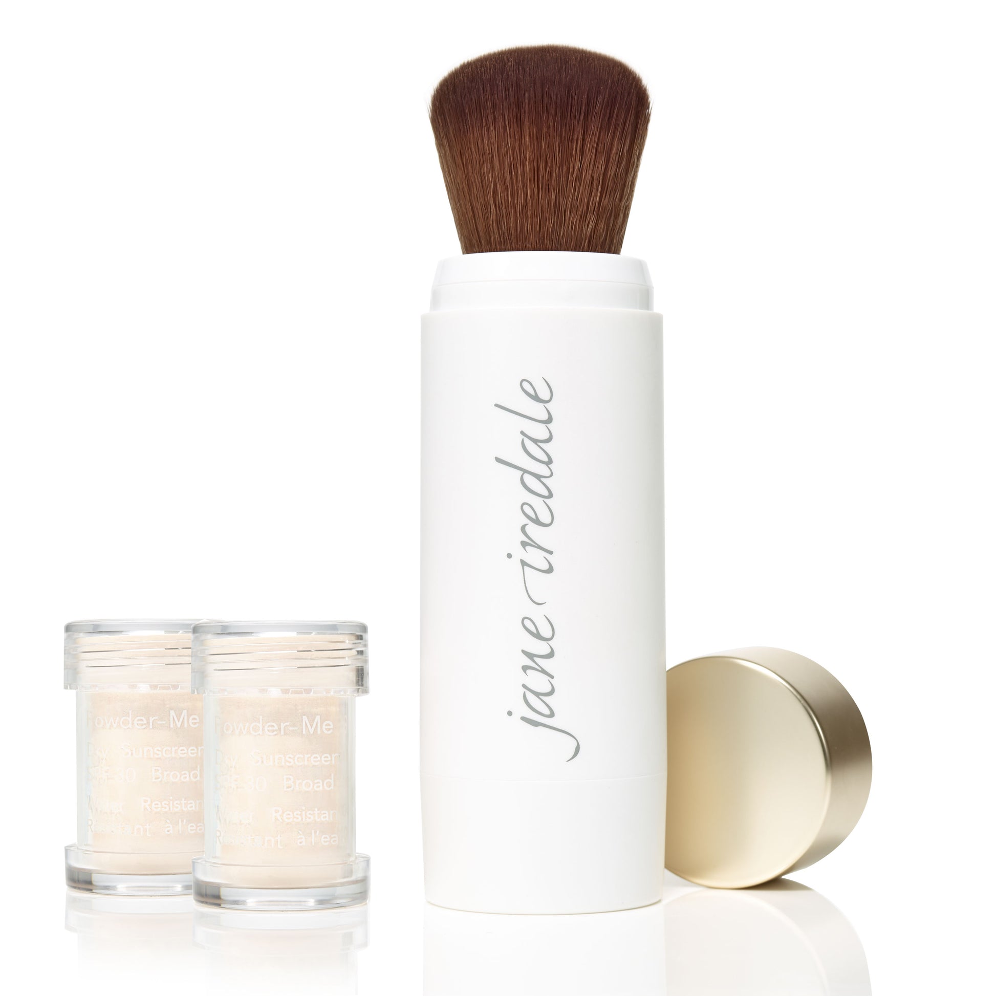 Powder-Me SPF 30 Dry Sunscreen with brush, includes refill pods and cap, showcasing a clean beauty option from Beauty Shop Bellaire.