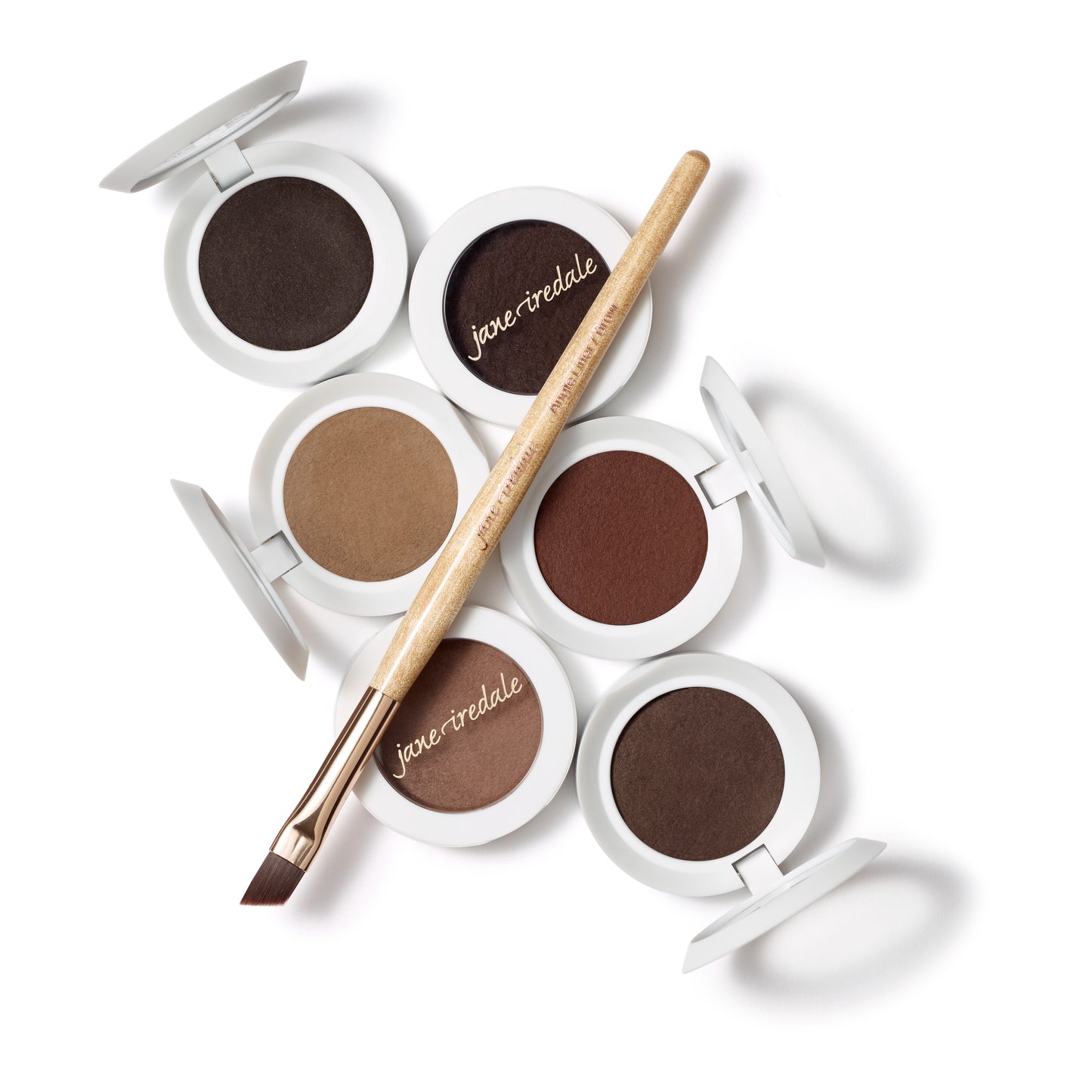 PureBrow® Brow Powder compacts in six shades with a jane iredale angled brush, showcasing natural, buildable, and long-wearing brow enhancement options from Beauty Shop Bellaire.