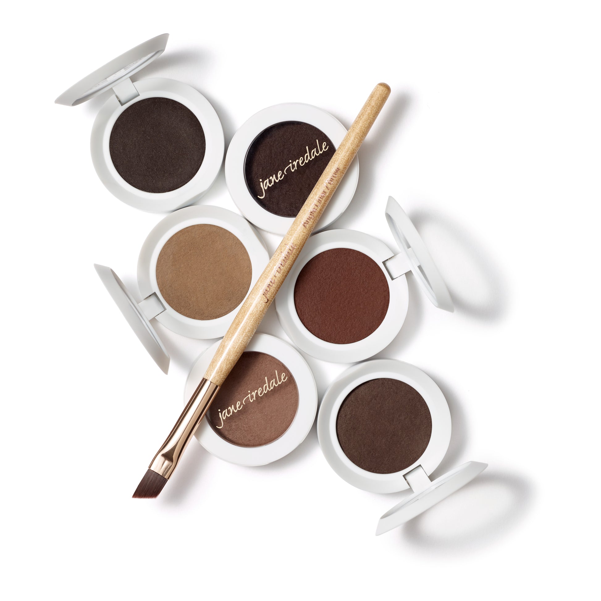 PureBrow® Brow Powder compacts in six shades with a jane iredale angled brush, showcasing natural, buildable, and long-wearing brow enhancement options from Beauty Shop Bellaire.