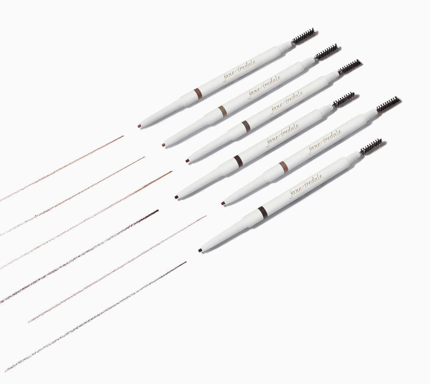 Six PureBrow® Precision Pencils diagonally arranged, showcasing retractable tips and spoolie brushes, alongside swatched brow shades from light to dark.