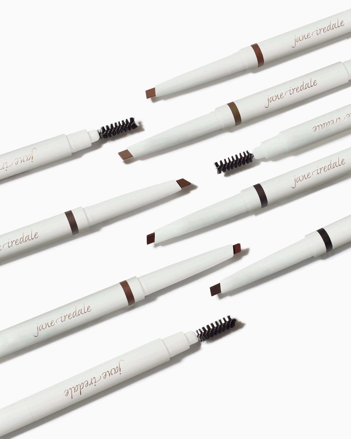 PureBrow® Shaping Pencils with angled tip and spoolie, ideal for defining brows. Creamy, long-lasting formula for precise application, showcased on a white background.