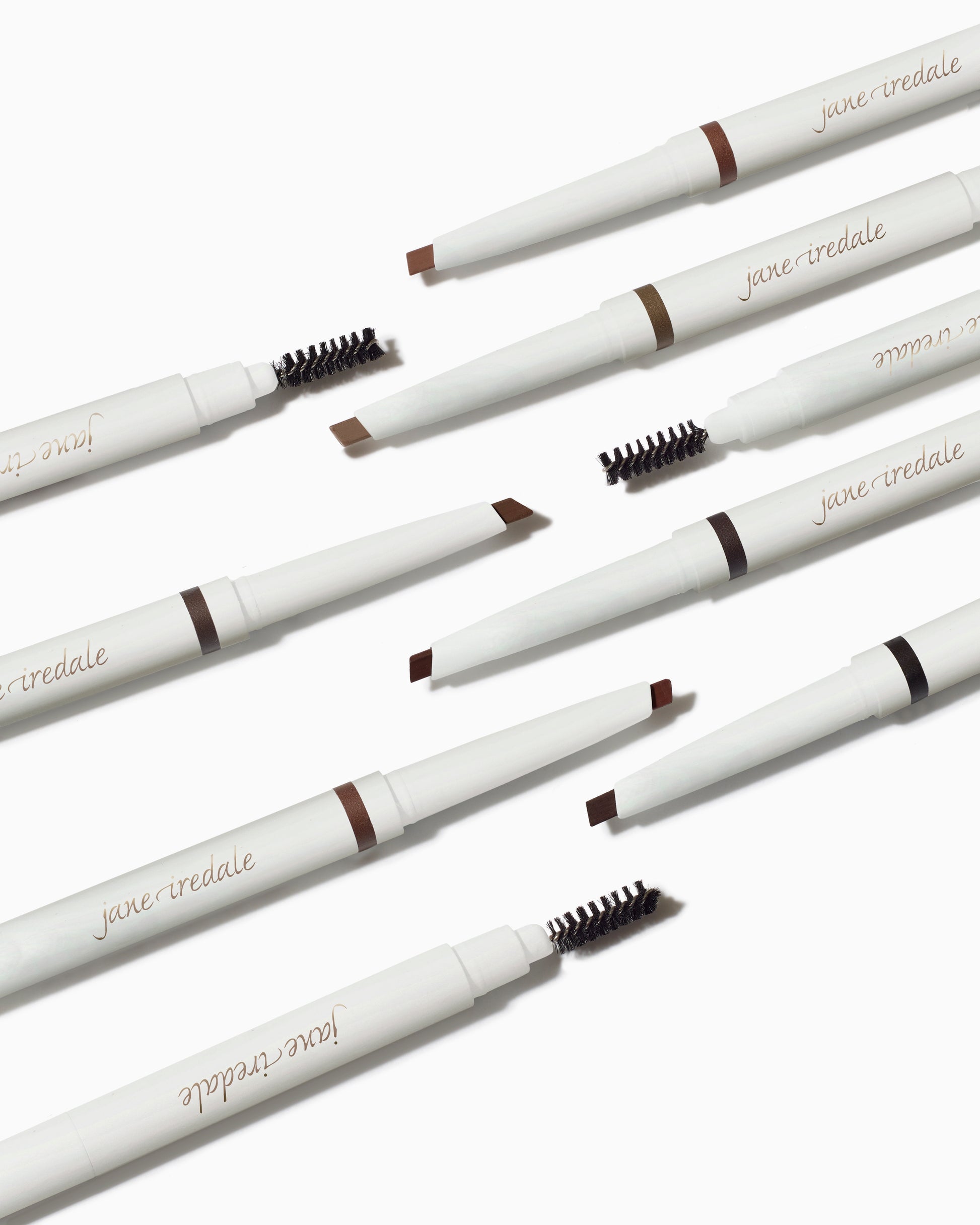 PureBrow® Shaping Pencils with angled tip and spoolie, ideal for defining brows. Creamy, long-lasting formula for precise application, showcased on a white background.