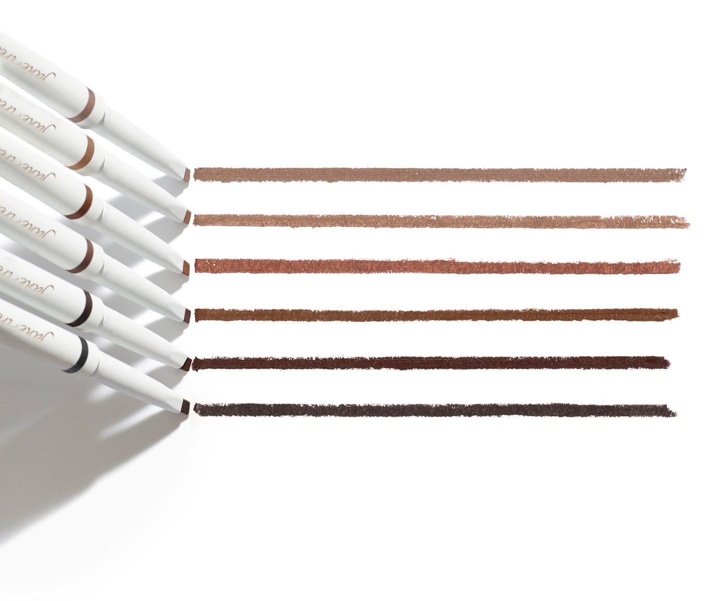 PureBrow® Shaping Pencil lineup in warm browns, showcasing smooth, creamy swatches. Ideal for defining brows with a built-in spoolie for a polished finish.