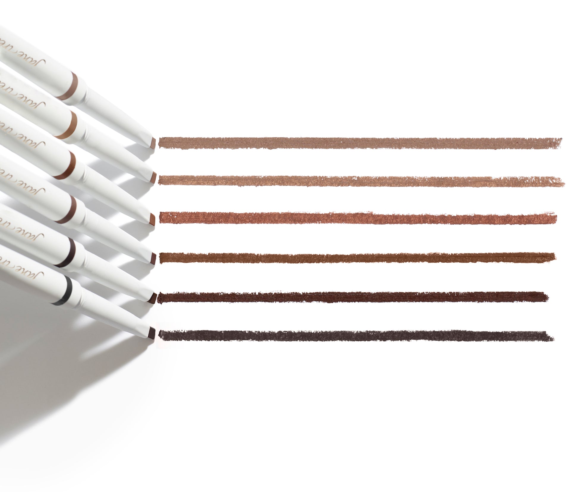 PureBrow® Shaping Pencil lineup in warm browns, showcasing smooth, creamy swatches. Ideal for defining brows with a built-in spoolie for a polished finish.