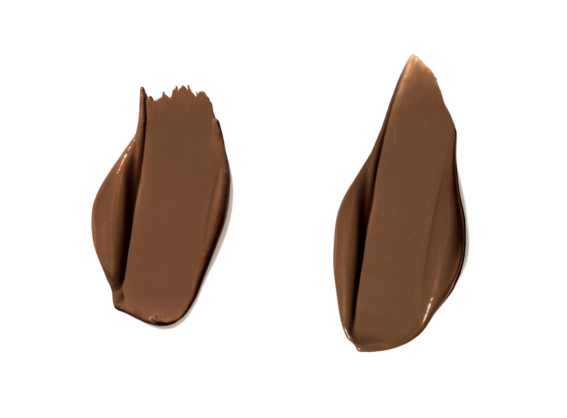 Two swatches of PureMatch™ Liquid Concealer showcase its smooth, creamy texture, highlighting its seamless blendability and natural, skin-like finish.