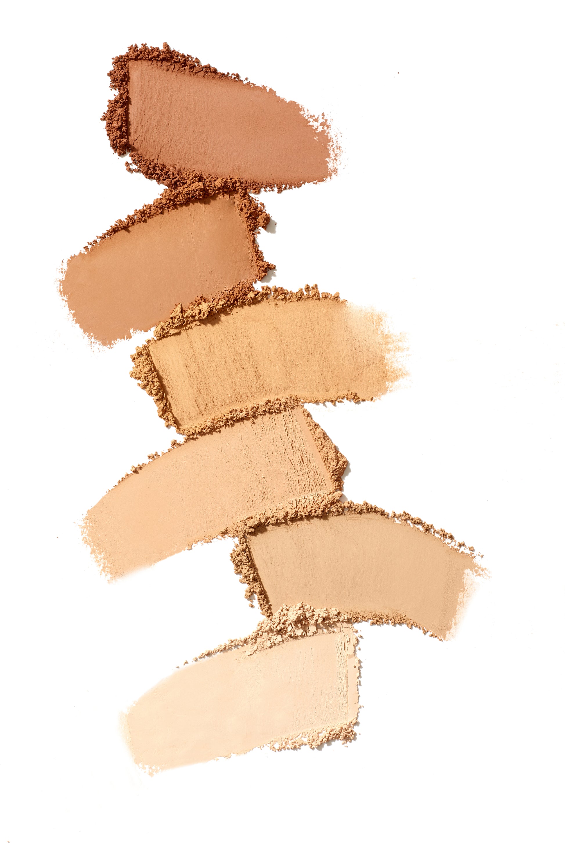 PurePressed® Base Mineral Foundation SPF 20/15 Refill swatches in tan to beige shades, showcasing buildable coverage and natural finish. Ideal for clean, sustainable beauty enthusiasts.