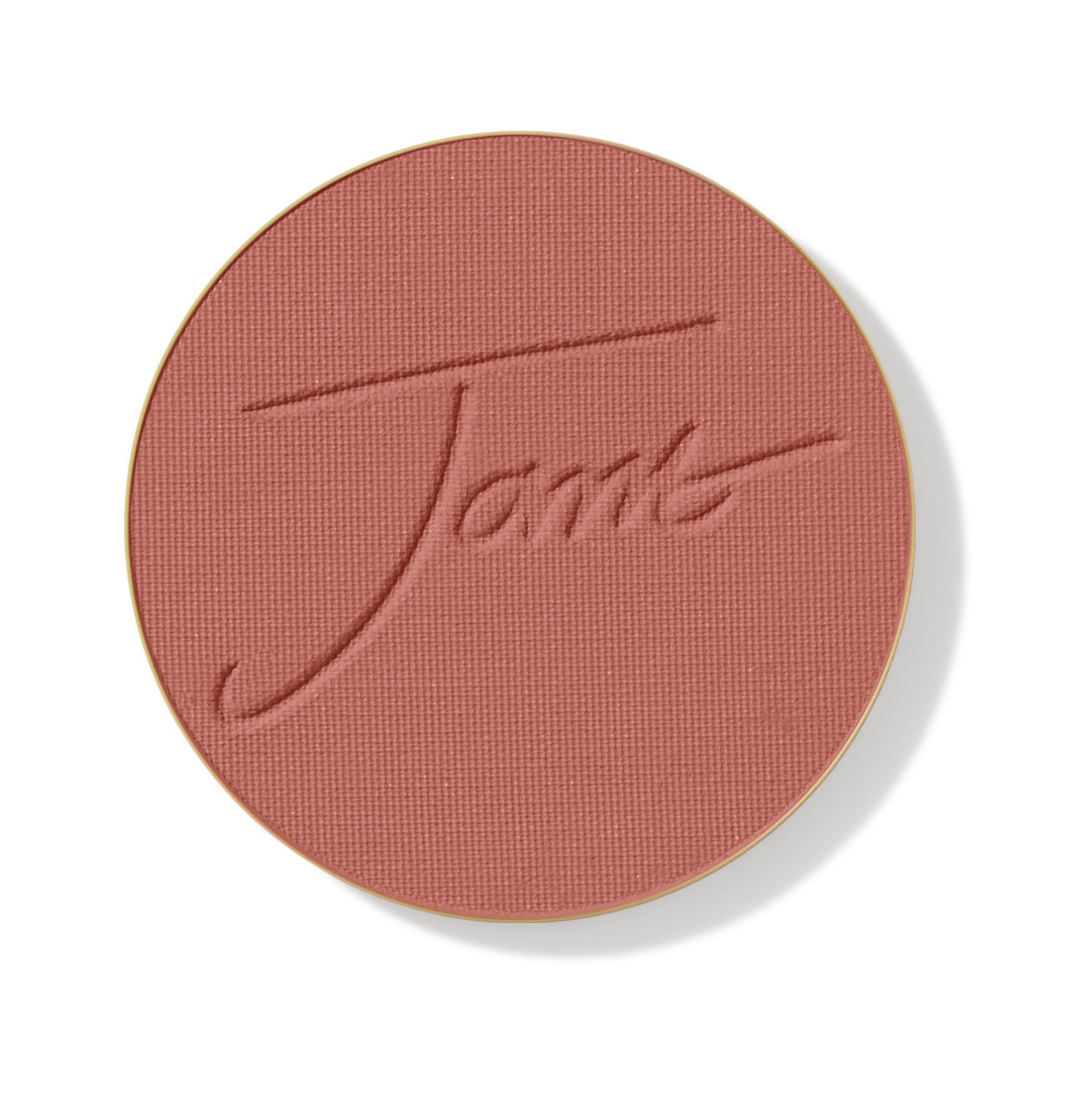 Tarte Cosmetics’ PurePressed® Blush in a round pan, featuring a warm, dusty-rose shade with Tarte embossed, showcasing its silky, buildable Amazonian Clay Blush formula.