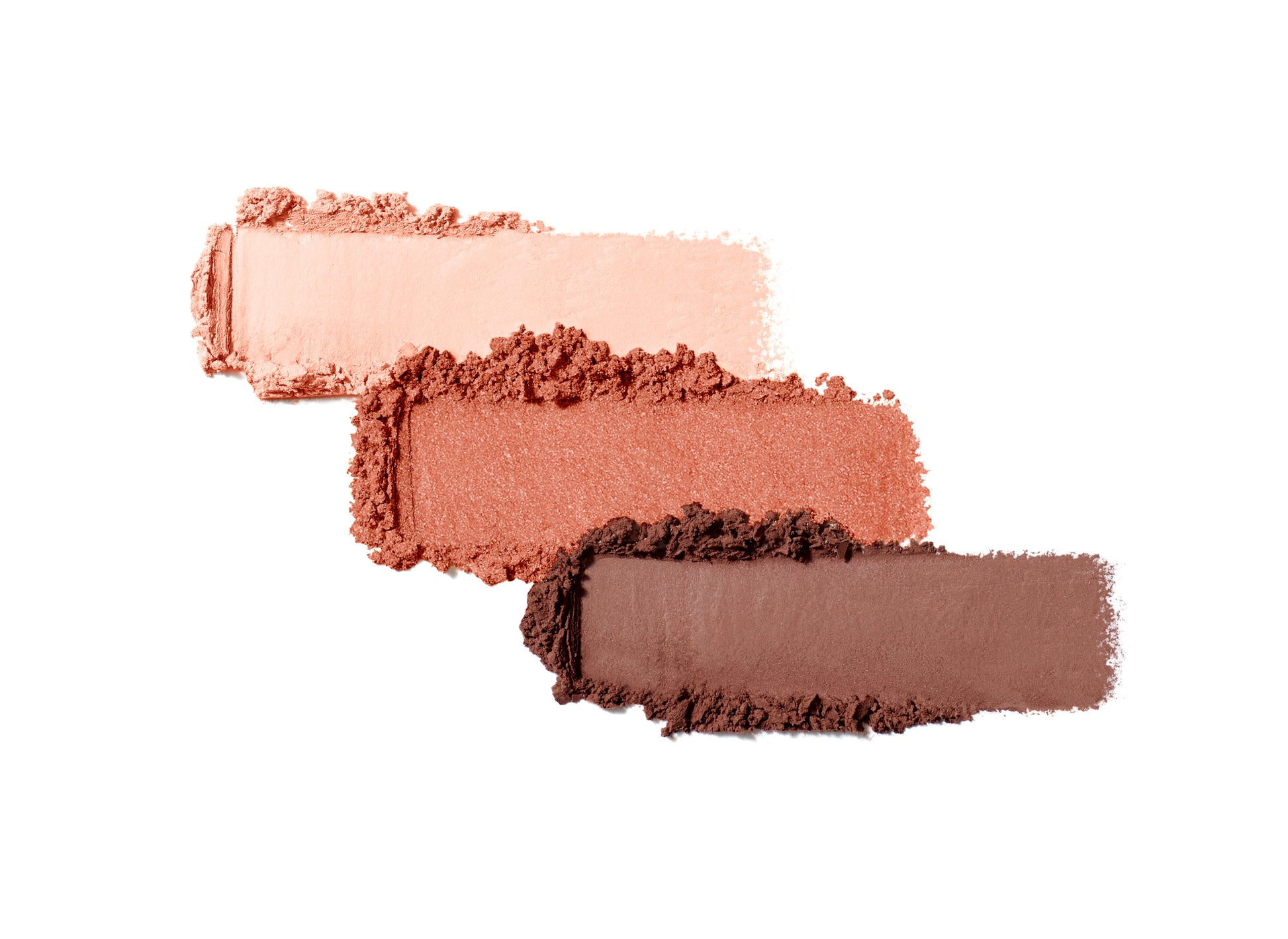PurePressed® Eye Shadow Triple showing peachy-pink, coral-peach, and medium brown crushed powders, highlighting the blendable, talc-free formula curated by makeup artist Rose-Marie Swift.
