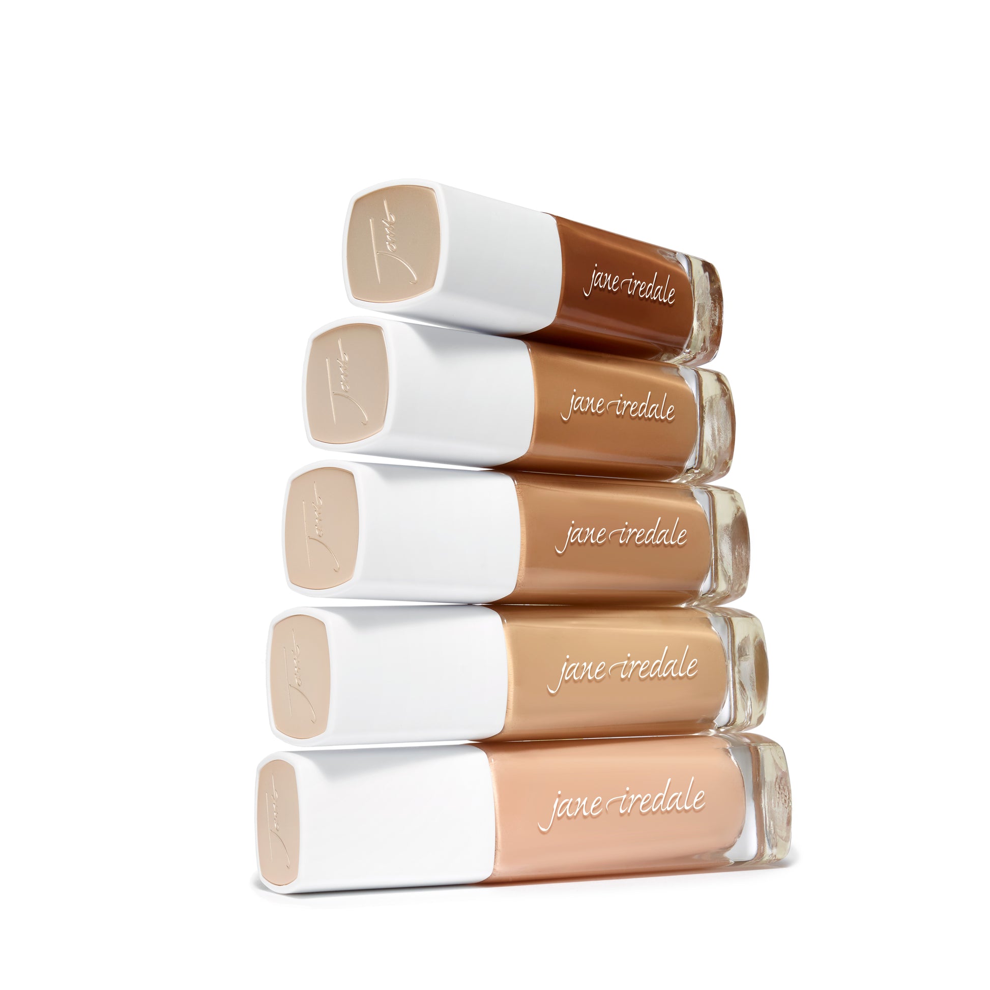 Jane Iredale Skintuition SPF 30 Radiance-Boosting Liquid Foundation in a vertical display of five shade tubes, showcasing its inclusive range from light to deep bronze.