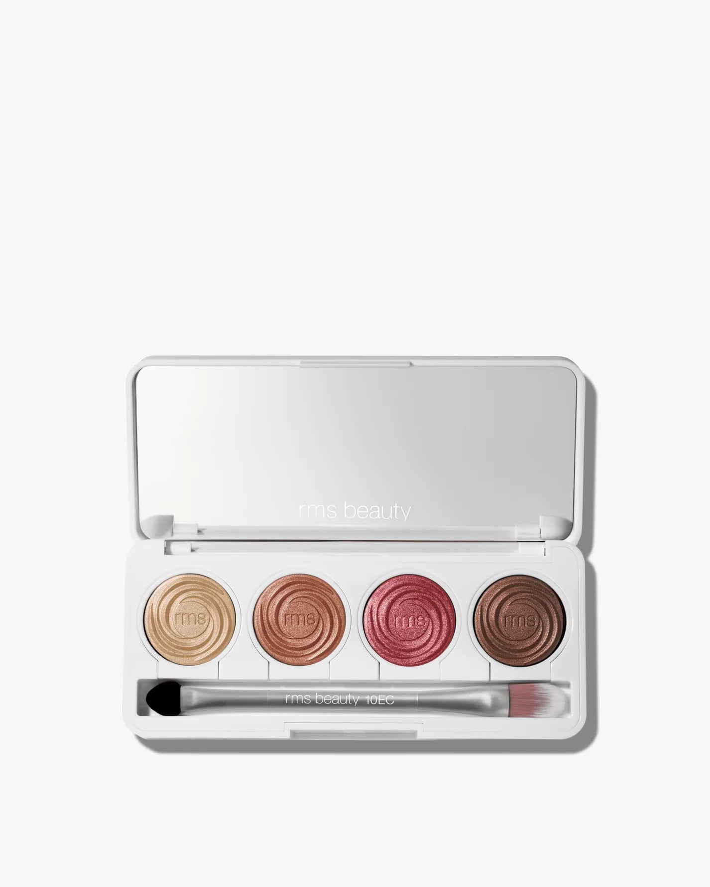 RMS Beauty ReDimension Hydra Eyes Quartet featuring four cream-to-powder eye colors and a dual-ended brush in a white compact with a mirror.