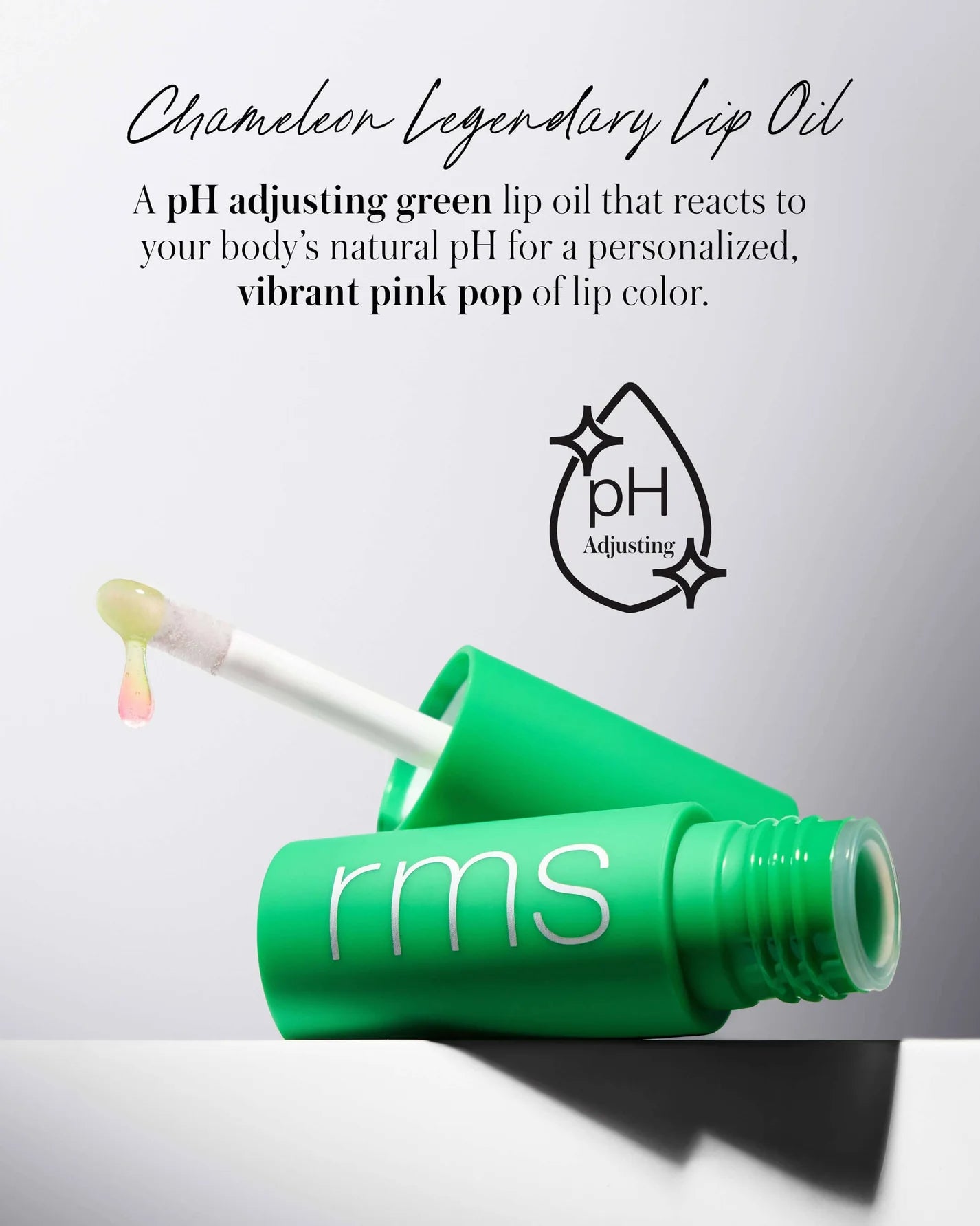 Mini Lip Oil Trio: Bright green tube with rms and wand showing green-to-pink oil, reacts to pH for personalized pink color.