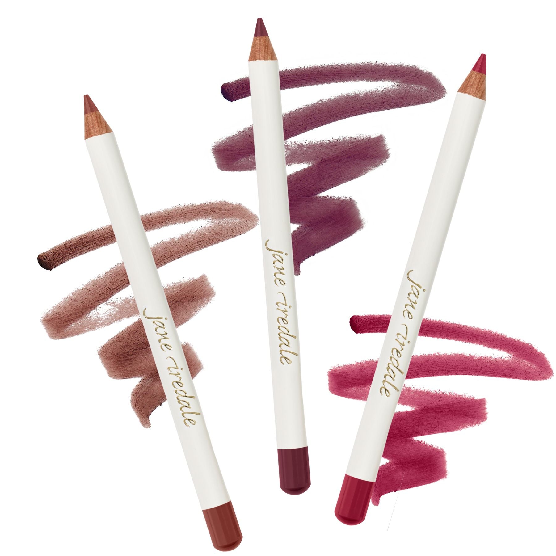 Jane Iredale Lip Pencil set showing three shades with gold lettering, highlighting smooth, precise application for long-lasting, natural lip color.