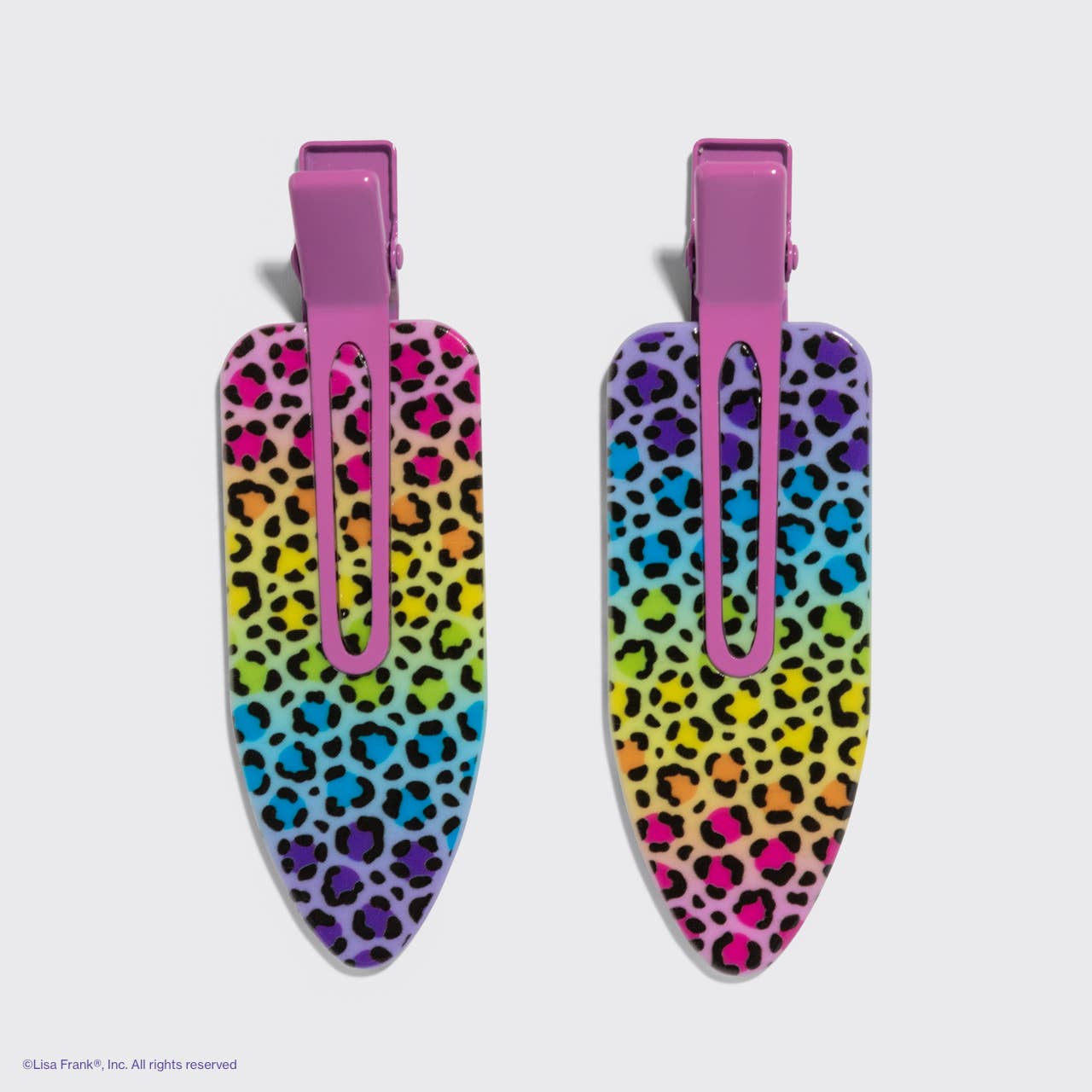 Lisa Frank x Kitsch XL Creaseless Clips in Rainbow Leopard, featuring a teardrop shape and rainbow leopard print, ideal for securing hair during beauty routines.